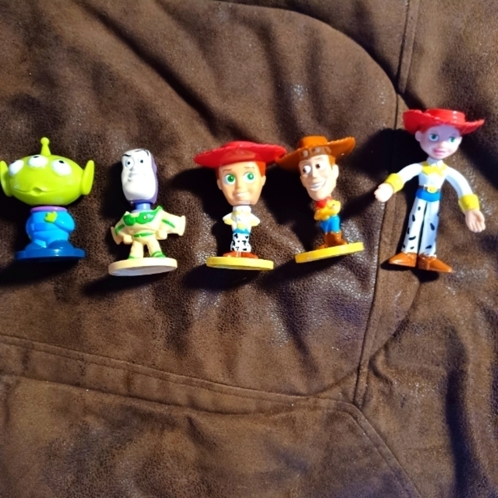 Vintage Disney Pixar bobble head collectibles.